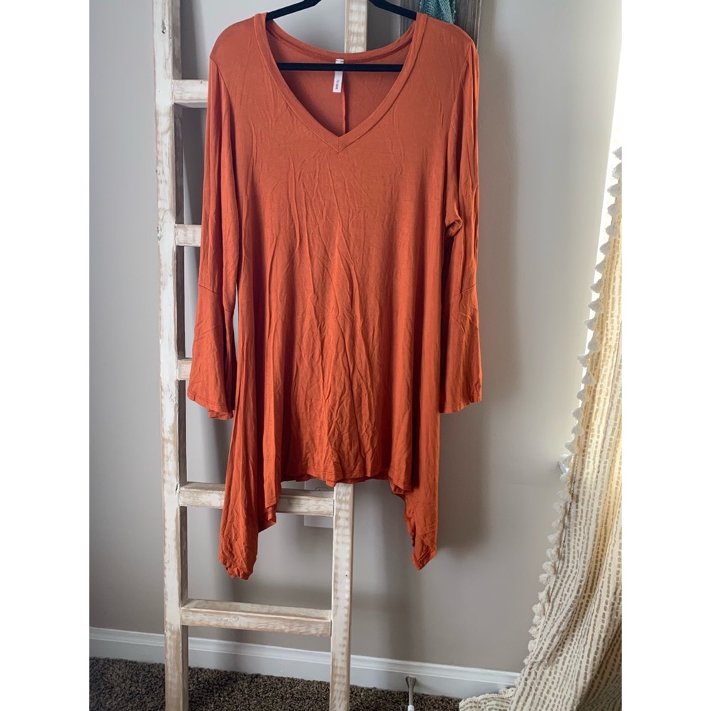 Burnt orange tunic with bell sleeves
